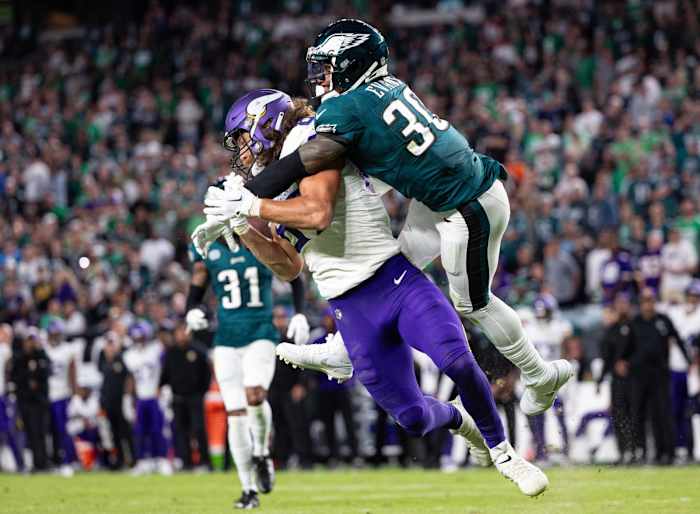 Sep 14, 2023; Philadelphia, Pennsylvania, USA; Philadelphia Eagles safety Justin Evans (30) breaks up a pass to Minnesota Vikings tight end T.J. Hockenson (87) during the fourth quarter at Lincoln Financial Field.